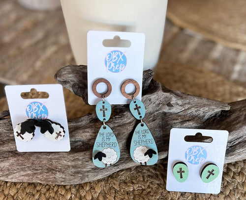 The Lord is My Shepherd Dangle and Stud Earrings, Cross Earrings, and Lamb Earrings.