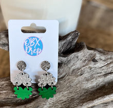 Hand-Painted Floral-Shaped St. Patrick's Day Wood Earrings with Polka Dot and Green Design.