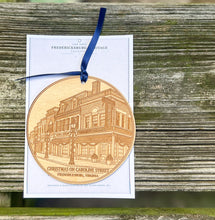 Custom engraved Fredericksburg landmark ornaments shown as examples of personalized town, monument and historic-location wood ornament commissions.